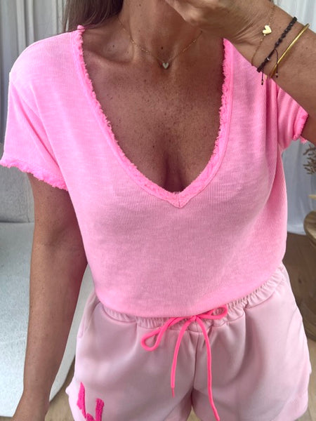 T-SHIRT V FRANGES DÉLAVÉ ROSE FLUO